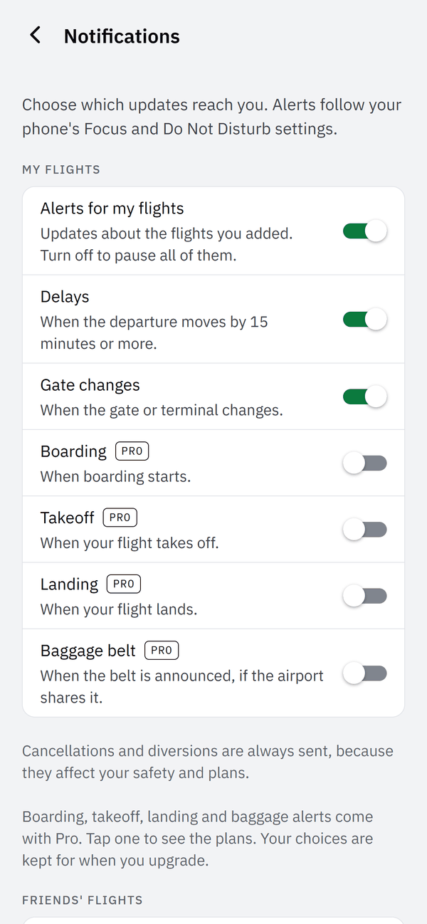Notifications screen: switches for delay, gate change, boarding, takeoff, landing and baggage-belt alerts; the last four are marked Pro